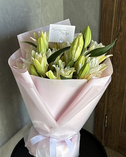 Белоснежные лилии в розовой упаковке with delivery to Astana